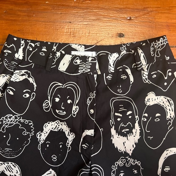 Urban Outfitters Shekou X-Small black pants with white faces EUC silky material - Picture 5 of 10